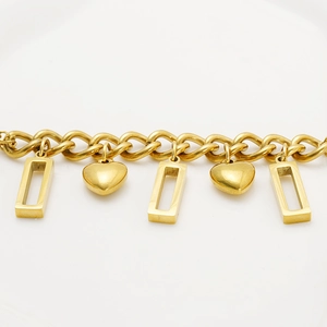 Golden stainless steel heart bracelet with chunky links and rectangular charms