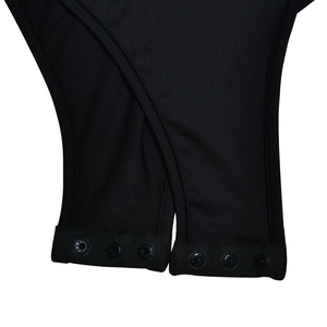 Detail of black V-neck bodysuit showing bottom three-button snap closure for easy wear