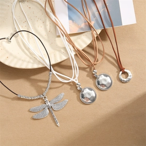 Vintage CCB dragonfly and hammered round metal pendants on cord necklaces set