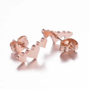 Three linked heart studs in rose gold stainless steel for women featuring a minimalist design