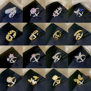 Collection of luxury butterfly and floral rings with zircon and gold plating