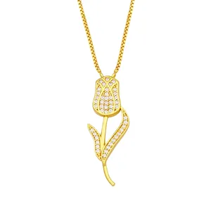 Élégant collier tulipe doré avec pavé de zircons brillants sur une chaîne box