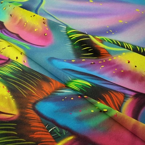 Macro detail of high-quality printed mushroom tapestry fabric with vibrant spray-paint patterns
