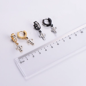 Polished stainless steel cross hoop earrings with white crystals and size ruler