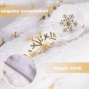 Detail of white plush Christmas tree skirt featuring golden sequin snowflakes and magic stick