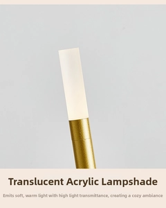 Detail view of the translucent acrylic lampshade and gold metal stand on Aladdin lamp