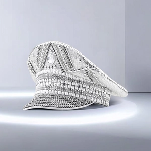 Macro shot of silver sequins, rhinestones, and studs on this captain hat detail