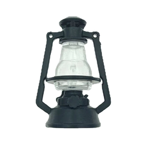 Macro shot of a vintage style miniature black lantern with clear plastic dome