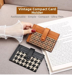 Detail showing retro houndstooth pattern and leather card slots with snap button closure