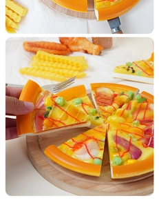 Close-up of realistic PU faux pizza model with sausages, fries, and chicken wings