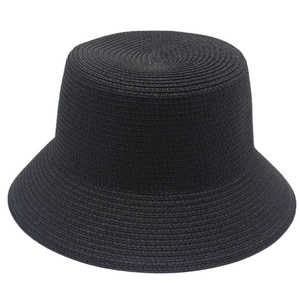 Minimalist black woven straw bucket hat for sun protection with detailed straw texture