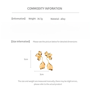 Detailed size specifications for alloy flower pattern earrings showing 9cm length and 3cm width