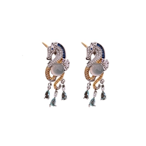 Elegant unicorn drop earrings featuring blue zircons and silver needle studs for women