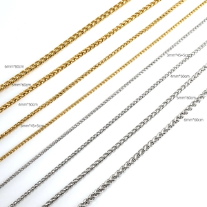Detail showing assorted stainless steel wheat chains in multiple sizes and gold silver finishes