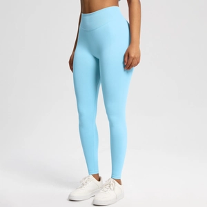 Detailed close-up of seamless sky blue yoga leggings with high waist and ribbed texture