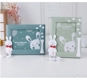 Detail of 18.5x13.5cm green rabbit photo frames with stitching and 3D bunny decor
