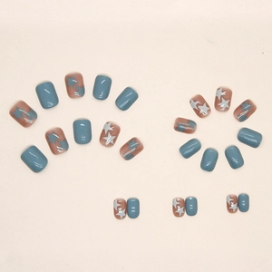 Short square press-on nails in lake blue and transparent gray star patterns