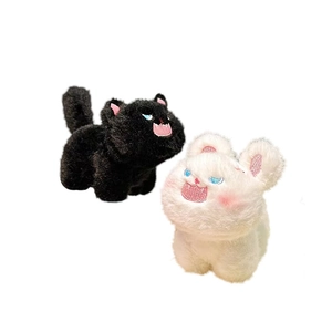 Cute black and white plush cat monster keychain charms with vivid embroidery on white background