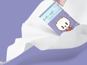 Close-up of portable 10-pack baby wet wipes with soft dink cat packaging on cloth