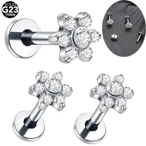 G23 titanium flower lip and ear stud with clear zircon stones shown in multiple views
