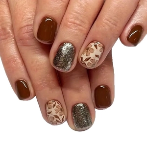 Short press-on nails set with brown, silver glitter, and vintage floral leaf patterns