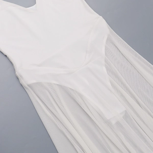 Detailed overhead view of the white dress featuring mesh paneling and sheer fabric textures