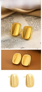 Macro detail of curved rectangular 18K gold earrings with polished geometric metal texture