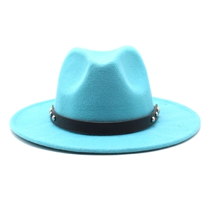 Close-up of cyan wool fedora hat with black leather band and silver metal rivets