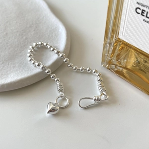 Minimalist 925 sterling silver bead bracelet with a polished heart charm and hook clasp