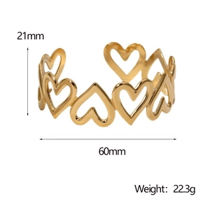 Detail view of 18k gold plated stainless steel heart bangle with 21mm height and 22.3g weight