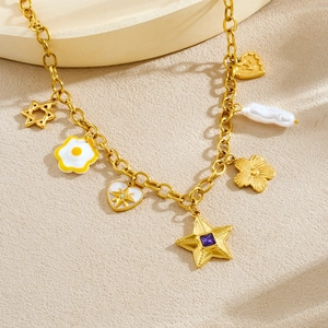 Gold star and baroque pearl charm necklace with colorful crystal pendants on beige background