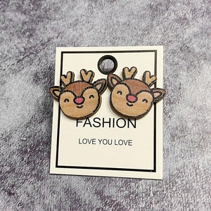 Christmas reindeer wooden stud earrings with cute cartoon design and natural wood texture