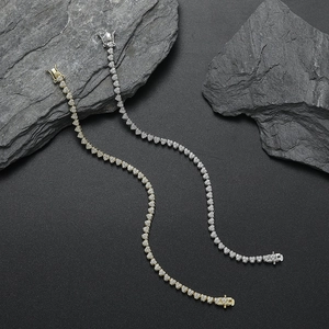 Hip hop tennis chain bracelet featuring heart-shaped cubic zirconia in gold and silver