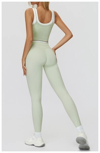 Back view of high waist light green yoga set with double layer sports tank and leggings
