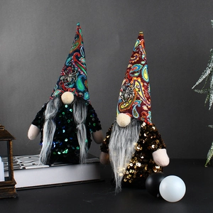 Halloween faceless gnome dolls with blue and gold sequins and paisley patterned hats