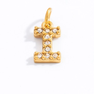 Detailed view of gold letter I pendant with micro-pave white zircon crystals