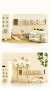 Frog shaped adhesive plug holder comparison showing organized cords on a creamy wall