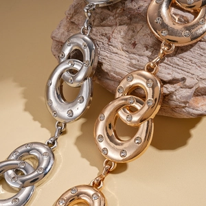 Luxurious interlocking geometric waist chain with white rhinestones in gold and silver