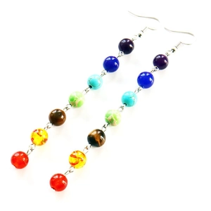 Colorful chakra gemstone bead earrings with handmade tassel and metal hooks on white background
