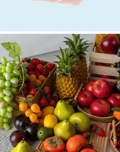 Detailed close-up of various realistic artificial fruits in woven baskets for home decor