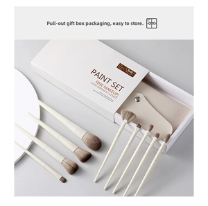Detailed set of 10 soft makeup brushes with white storage pouch and sliding gift box