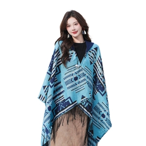 Ethnic blue oversized shawl cape with geometric patterns and fringe for travel