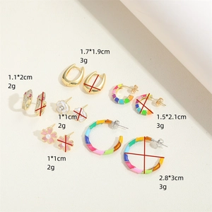 6-piece gold hoop earring set with snake, flower, and rainbow designs for women