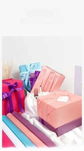 Colorful gift wrapping paper rolls for weddings and Valentine gifts with elegant bows