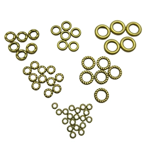 Antique bronze finish metal jump rings in smooth twisted and textured styles for DIY jewelry