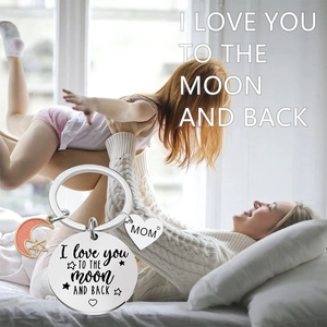 Detail of I Love You To The Moon And Back keychain with Mom heart charm and moon pendant