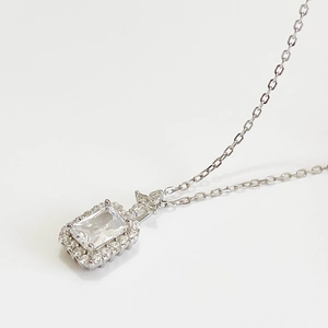 Elegant S925 sterling silver necklace featuring a rectangular emerald cut zircon pendant