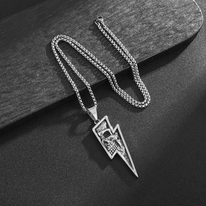 Retro punk lightning bolt pendant with skull and dragon motifs on silver steel chain