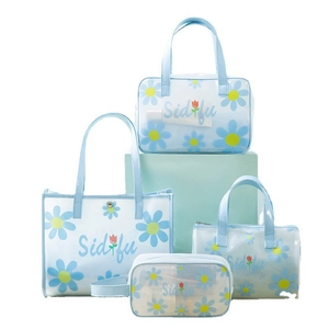Light blue floral PVC toiletry bag 4-piece set with waterproof daisy print design