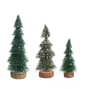 Three-piece set of mini green Christmas trees with white snow effect and wooden base